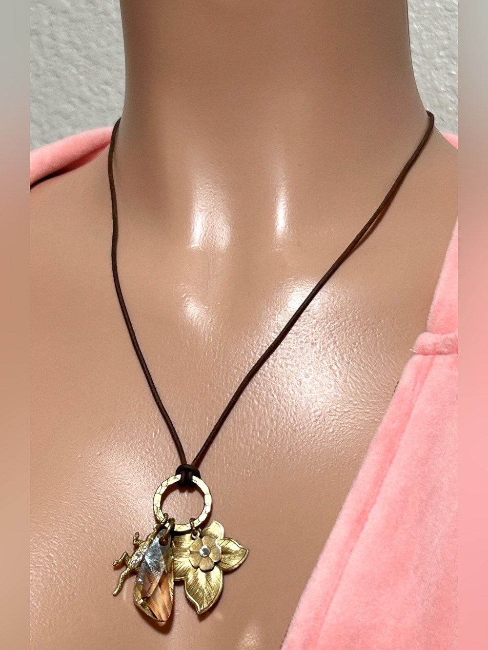Gold Floral and Leaf Charm Necklace on Brown Cord
